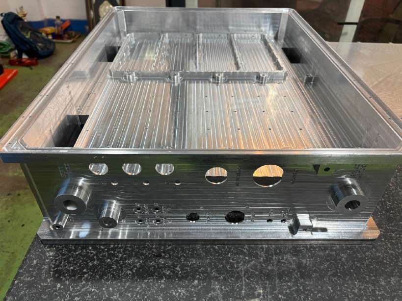 Machined plate component